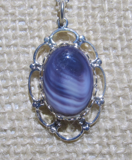 Wampum Cabochon in Web Setting